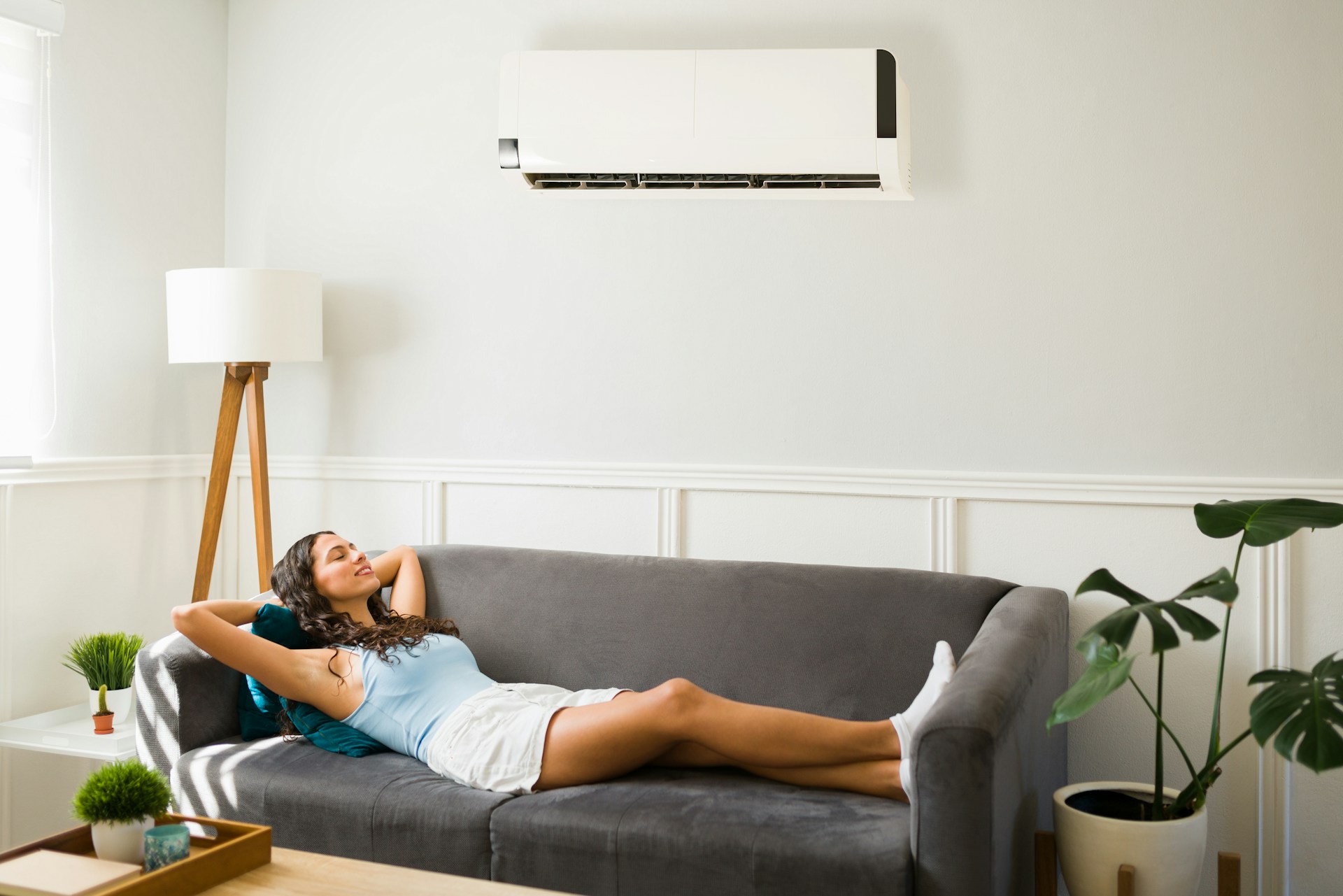 woman at home with cooling system